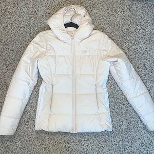 I sell this nice Adidas Puffer jacket. It’s a small and creme colored.